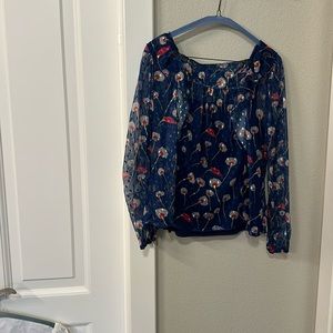 Long sleeve blouse with sheer sleeves and details